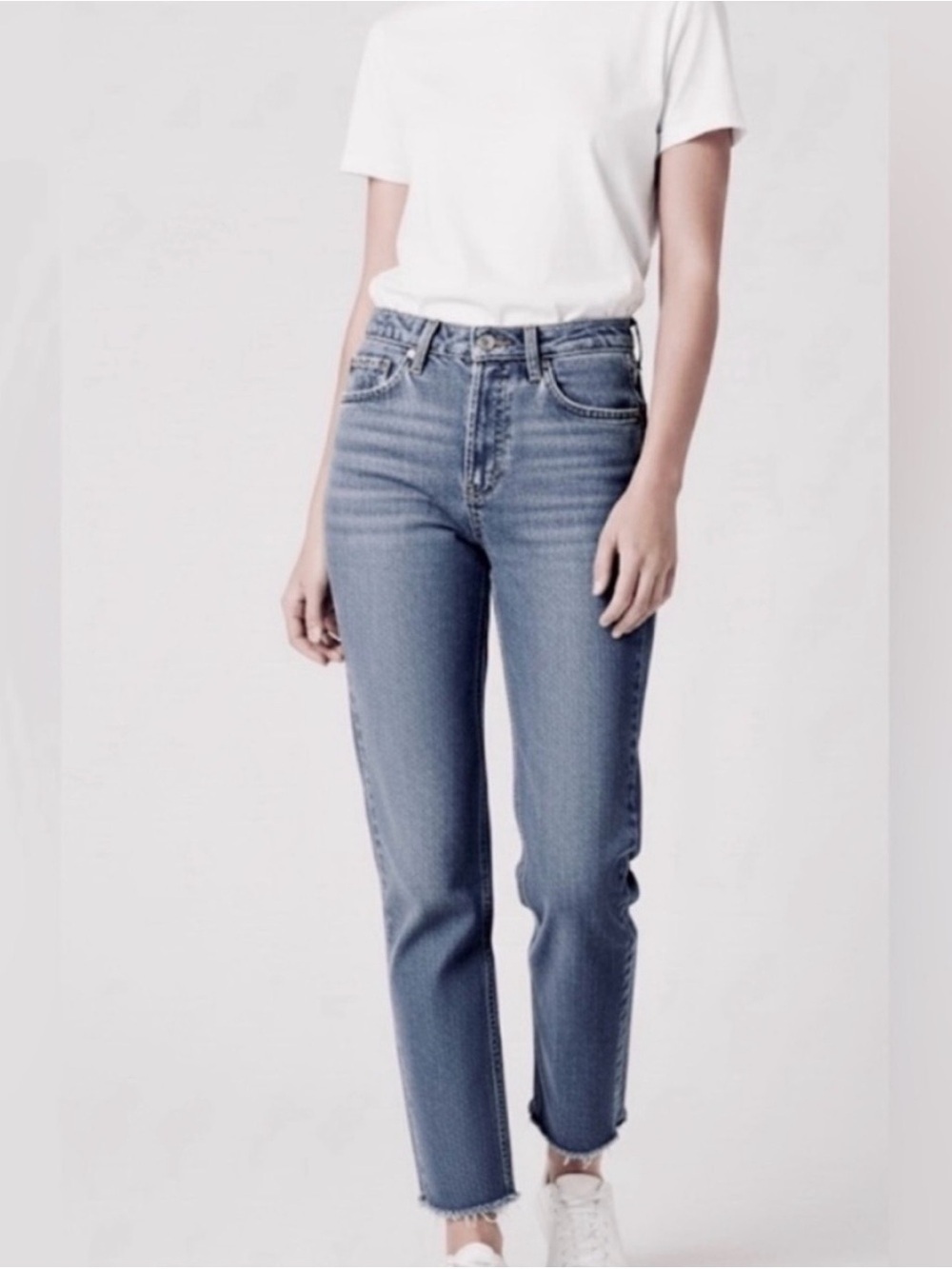 Vintage Polo Mom High
Waisted
Company Ralph Lauren Jeans
raw hem size 23/24